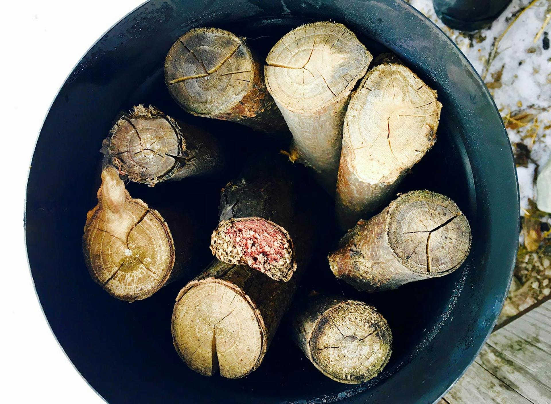 Food Lab at SHO: vegan gastronomy in a cold climate | custom-made, high-heat resistant metal container filled with hardwood logs headed to tarm-wood-fired boilers for conversion to wood charcoal