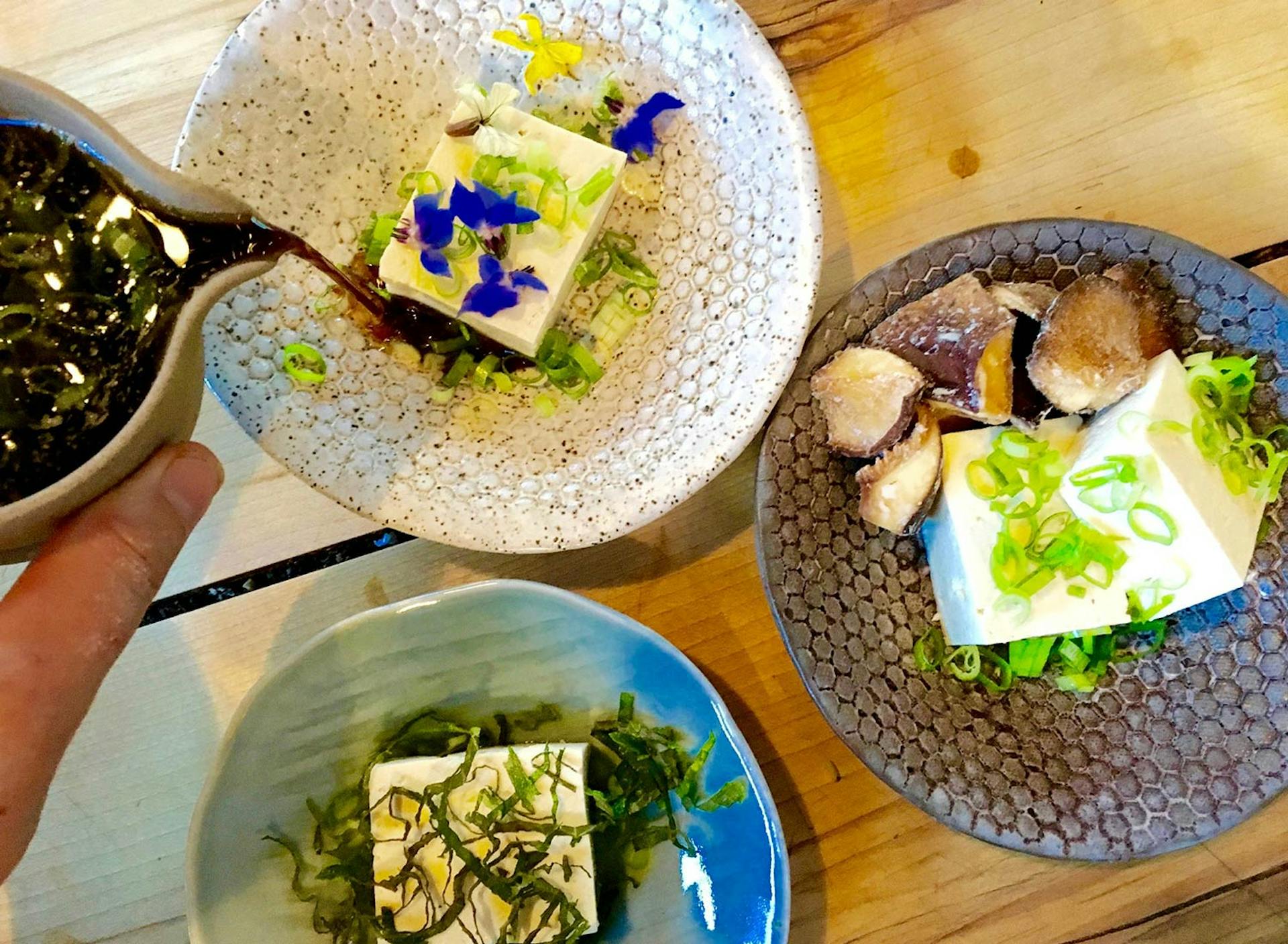 Food Lab at SHO: vegan gastronomy in a cold climate | homemade bean curd topped with shiso, scallions, flowers & deep-fried shiitake mushrooms 